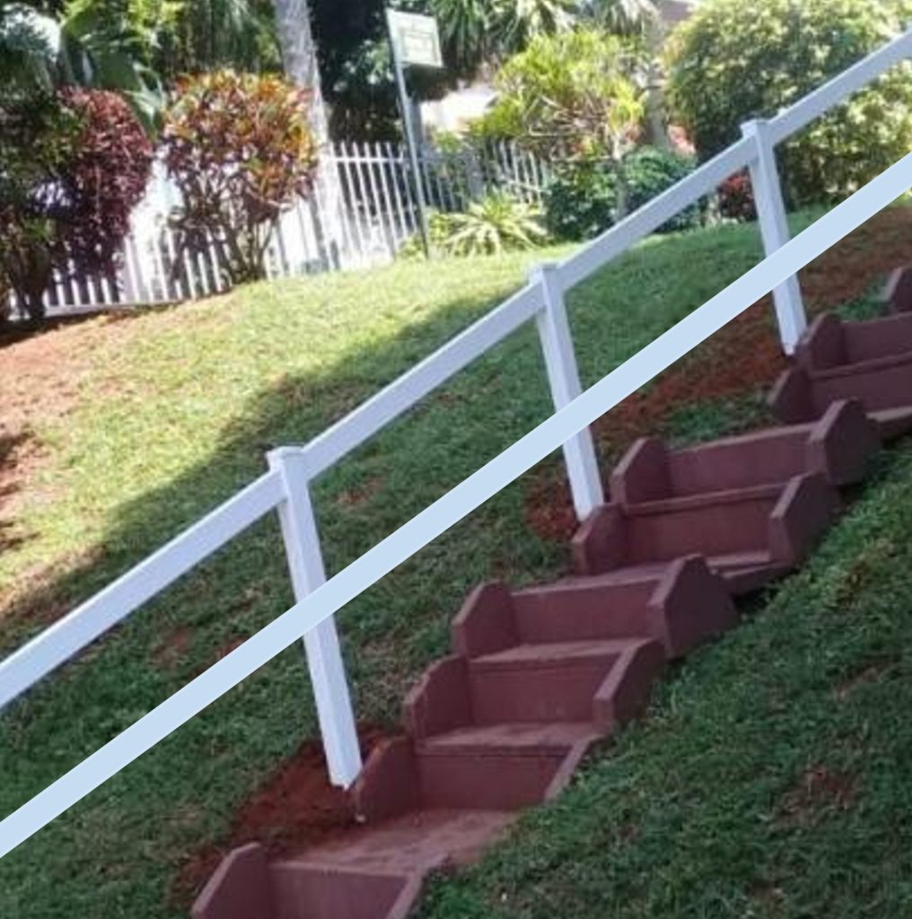2-rail PVC handrail system installed on a staircase